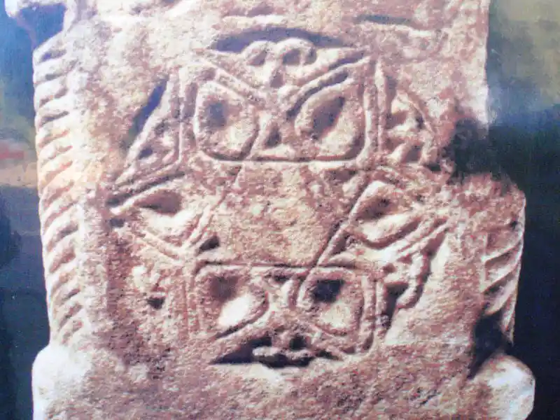 Tombstone (Mezar Tasi, Grabstein) engraved with solar discs and geometrically derived crosses